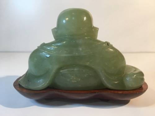 A CHINESE ORIENTAL GREEN STONE CARVED BUDDHA