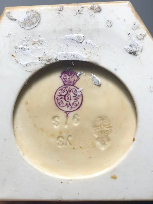 A PAIR OF ROYAL WORCESTER HADLEY COUNTRIES OF THE WORLD FIGURINES