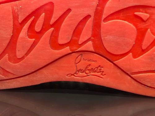 A Pair of Second Hand Christian Louboutin Red Spike Boat Shoes size 8.5