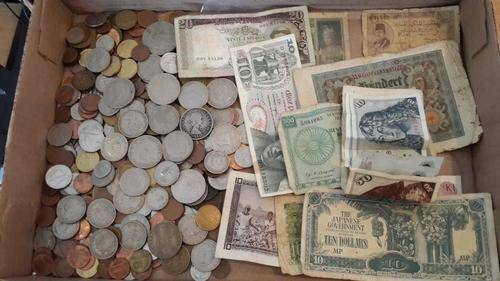 ONE BID FOR THE LOT Huge lot of   world  coins. I haven't counted them but I would estimate between