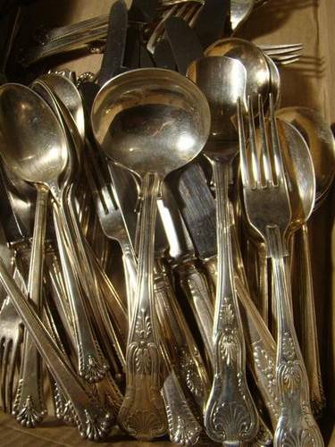 An EPNS CUTLERY SET, by Cooper Bros., comprising 7 Table Knives, 5 Table Forks, 7 Dessert Knives, 6