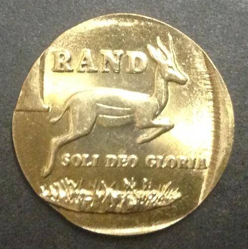 Mint Error R1 Struck on 10c  Planchet  *Nice Condition