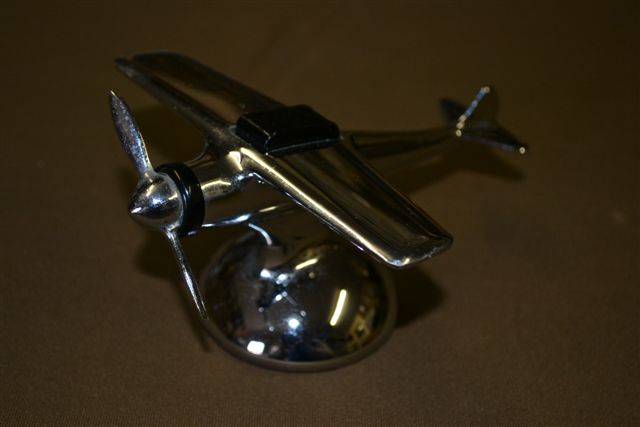 Chrome plane desk lighter made by A Hamilton Product. Made in USA.