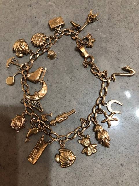 Gold Charm Bracelet with 23 Gold Charms - 30g