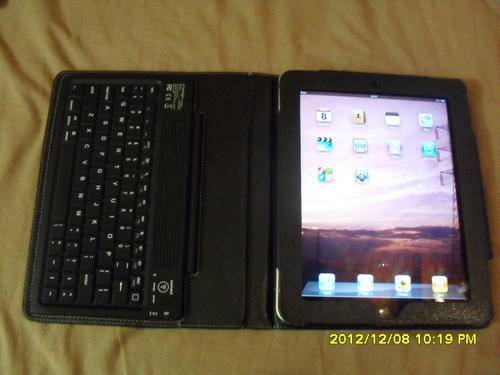 APPLE IPAD 1 64 GB wifi , black + wirless keybord and ipad pouch .