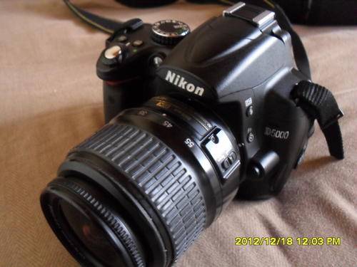 NIKON D5000 with 18-55mm 1:3.5-5.6 GII  ED   DX nikon lens .