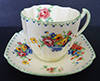 ART DECO ROYAL PARAGON BY APPOINTMENT - PETIT POINT CROSS STITCH DUO SMALL CUP AND SAUCER CIRCA 1933
