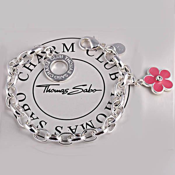 Designer's Silver Bracelet with a Crystal Flower Charm*imported