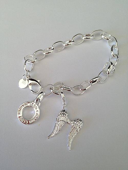 Designer's Silver bracelet with a Angel's Wings Charm*imported