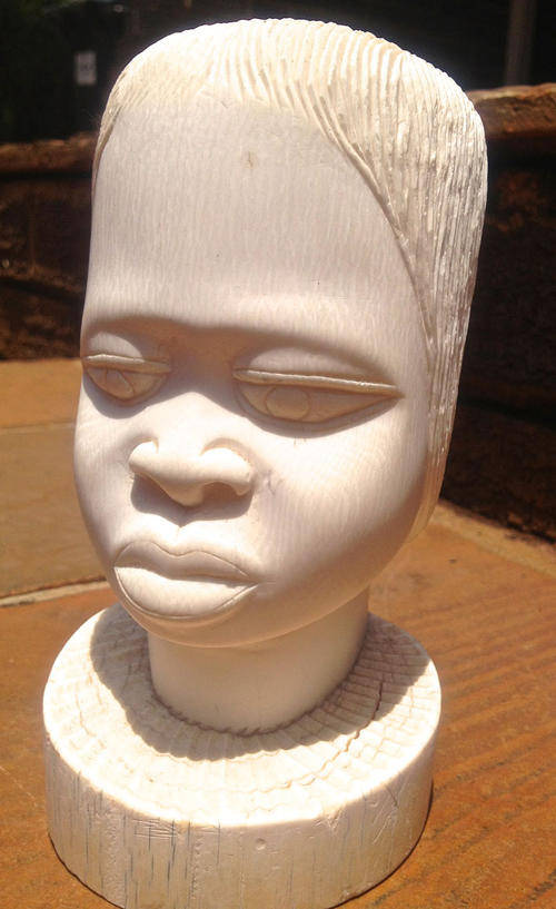 GENUINE CARVED IVORY SCULPTURE