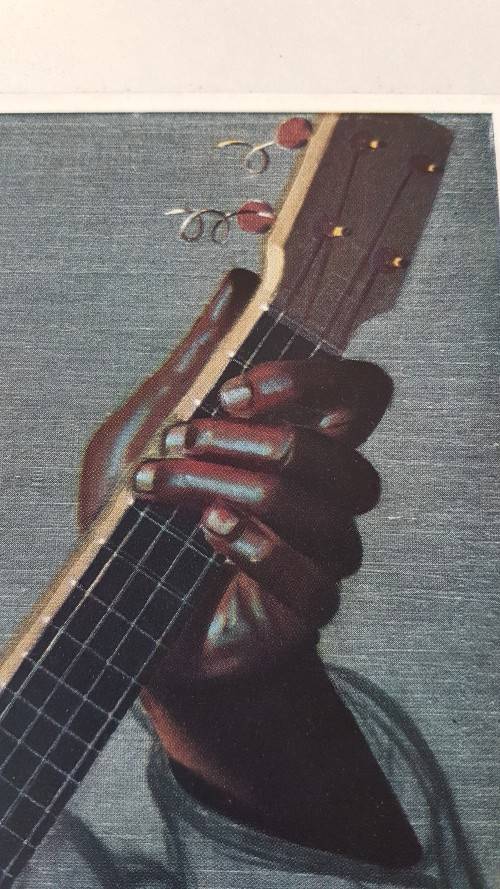 HAND SIGNED Tretchikoff  Cape Carnival Banjo Player.  Ornate black frame. Excellent condition.