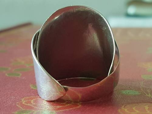 Stunning wrap around sterling silver ring.  12. 6 g . Marked 925