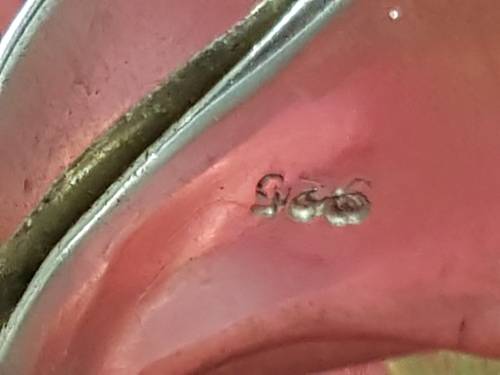 Stunning wrap around sterling silver ring.  12. 6 g . Marked 925
