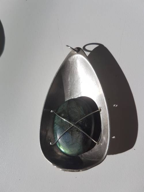 Namibian Labadorite in large teardop solid silver .800 setting with silver wire. 24.4 g!