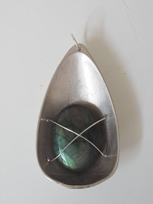 Namibian Labadorite in large teardop solid silver .800 setting with silver wire. 24.4 g!