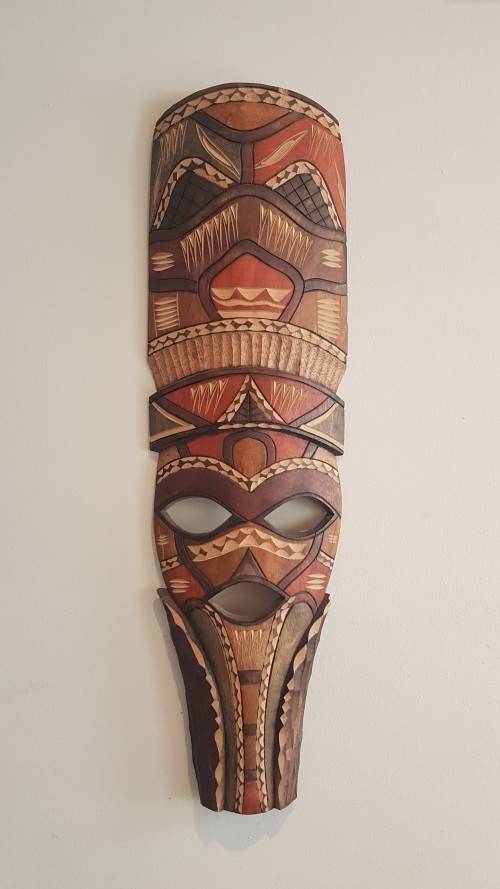 Ornate Mask. Solid wood intricately carved. 69 cm long. Excellent new condition.