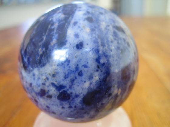 Solid sodalite ball. Like lapis lazuli, dark rich blue. Desirable semi-precious stone. 805 carats.