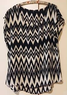 Cotton on Black & white top Says M but will fit L