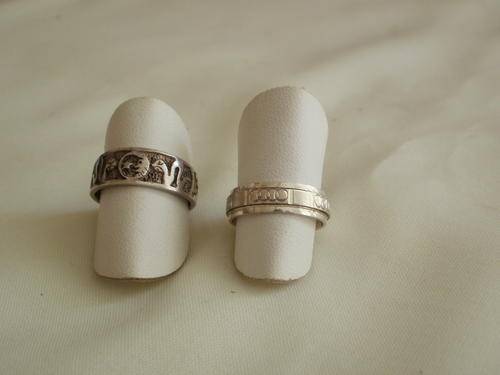 TWO SILVER RING'S (ONE SPINNER RING)