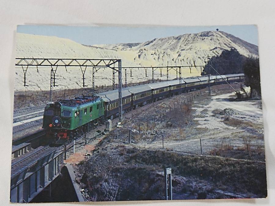 The old Blue Train hauled by a Class 3E electric locomotive. Postcard