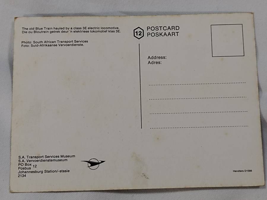 The old Blue Train hauled by a Class 3E electric locomotive. Postcard