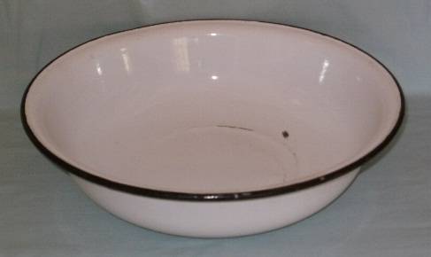 A BIG WHITE ENAMEL BOWL