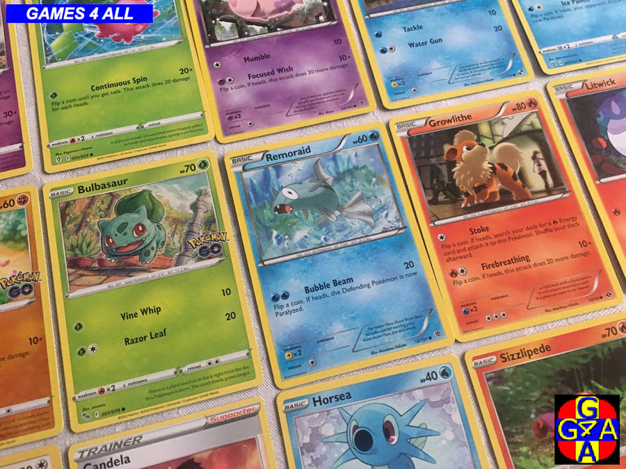 70 Pokemon Cards + 10 Tazos - NO FAKES