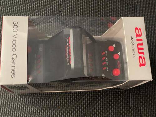 Aiwa Mini arcade system includes 300 Games preloaded.