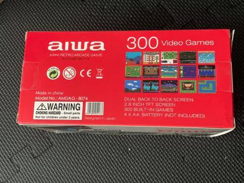 Aiwa Mini arcade system includes 300 Games preloaded.