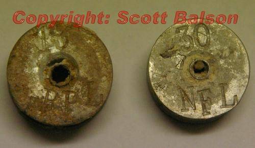 Extremely rare set of two RPL and NFL Larkan togt labour "bobbin" tokens