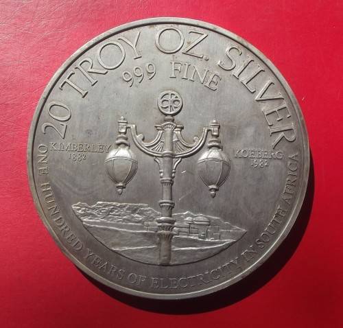 20 TROY OZ FINE SILVER - 100 YEARS ELECTRICITY. STAMPED ON RIM. BIG AND HEAVY!