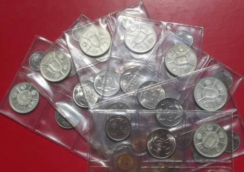 7 X 1974 MINT SETS WITH SILVER RAND. 15 GRAMS EACH. 80% SILVER. BID PER SET TO TAKE ALL 7.