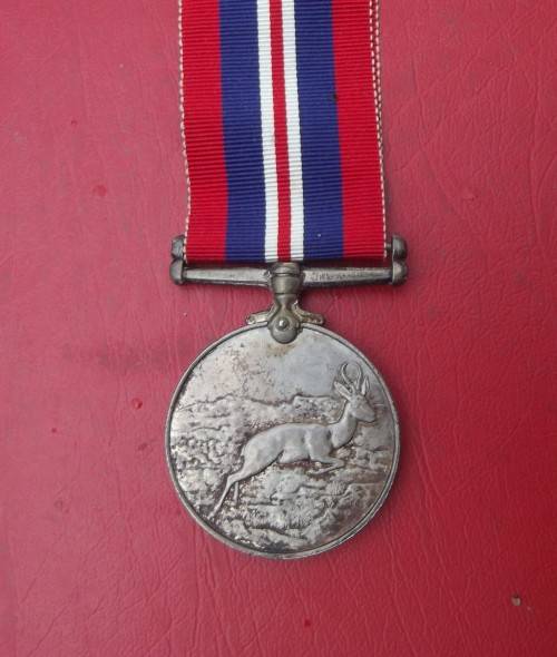 WW2 FULL SIZE SILVER AFRICA SERVICE MEDAL TO 110423 D.J. VAN HEERDEN.