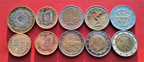 14 EUROS AND 3 BRITISH POUNDS IN COINS. MOSTLY LOOKING UNCIRCULATED.