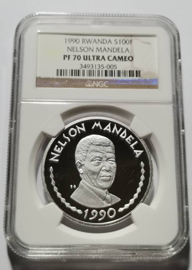 1990 RWANDA 1 0Z SILVER 100F MANDELA COIN. NGC PF70UC. HIGHEST GRADE AND SCARCE.