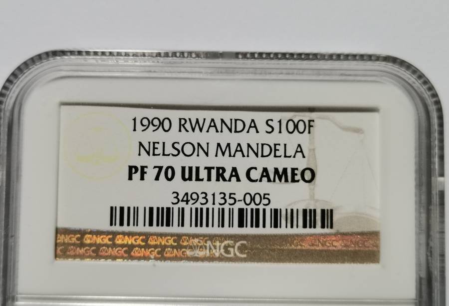 1990 RWANDA 1 0Z SILVER 100F MANDELA COIN. NGC PF70UC. HIGHEST GRADE AND SCARCE.