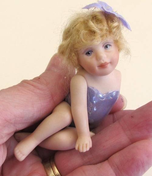 3 miniature fairy dolls in a mushroom garden (larger than 1:12" scale)