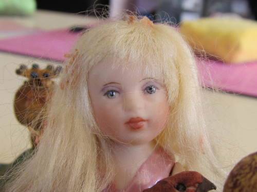 3 miniature fairy dolls in a mushroom garden (larger than 1:12" scale)