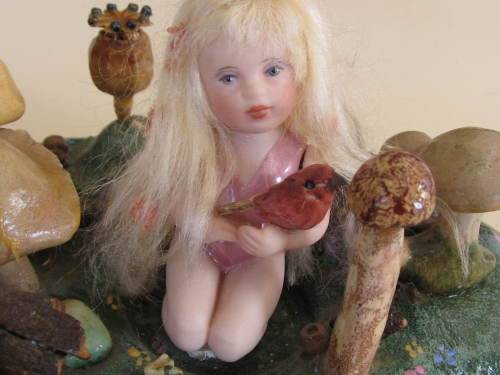 3 miniature fairy dolls in a mushroom garden (larger than 1:12" scale)