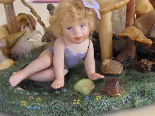 3 miniature fairy dolls in a mushroom garden (larger than 1:12" scale)