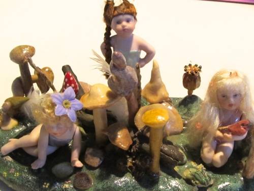 3 miniature fairy dolls in a mushroom garden (larger than 1:12" scale)