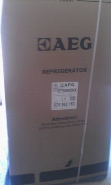 A New AEG Side by Side Fridge with home bar Model: S75090XNX