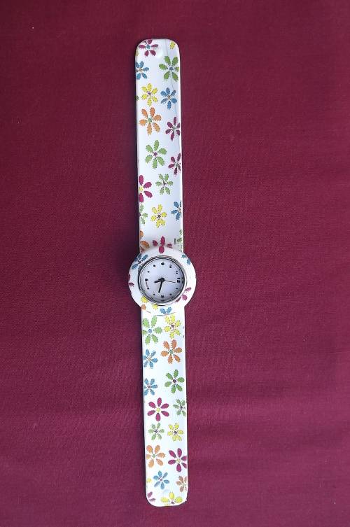 Bendable rubber ladies teen watch for the young at heart.Working.Floral design.