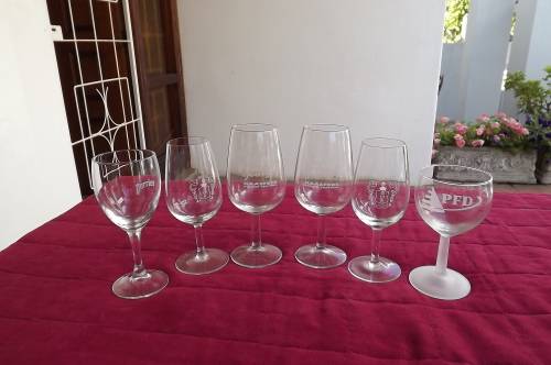 Lot of 6 different Logo wine  glasses in good condition.