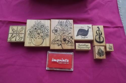 Set of 8 different stamps + pigment pad for craft work.New condition