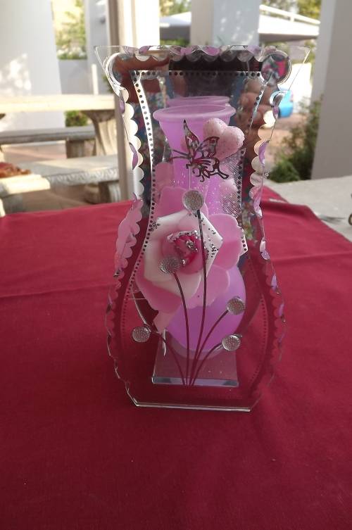 Ornament with pink flower vase.20cm high.Mirror at back with flower and perspex on front