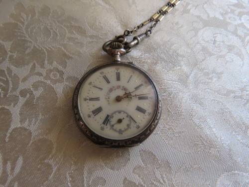 Antique pocket watch with chain 800 silver case and cylinder movement.Advance retard.