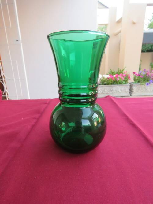Green glass vase in as new condition.Height 17 cm.Very pretty!! Anchor marking