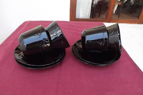 Set of 4 Black Porcelain Cups & Saucers in very good condition with pretty design