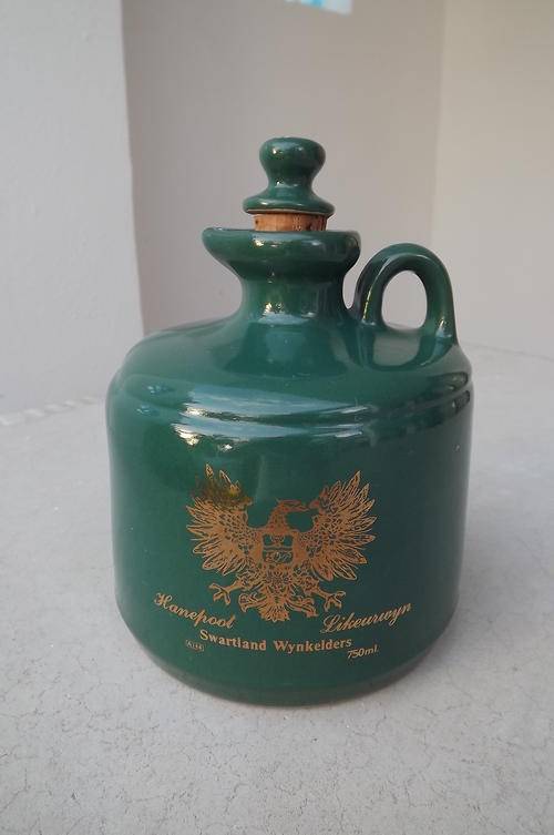 Dark green stoneware 750ml "Swartland Wynkelders" carafe with cork in.New condition.
